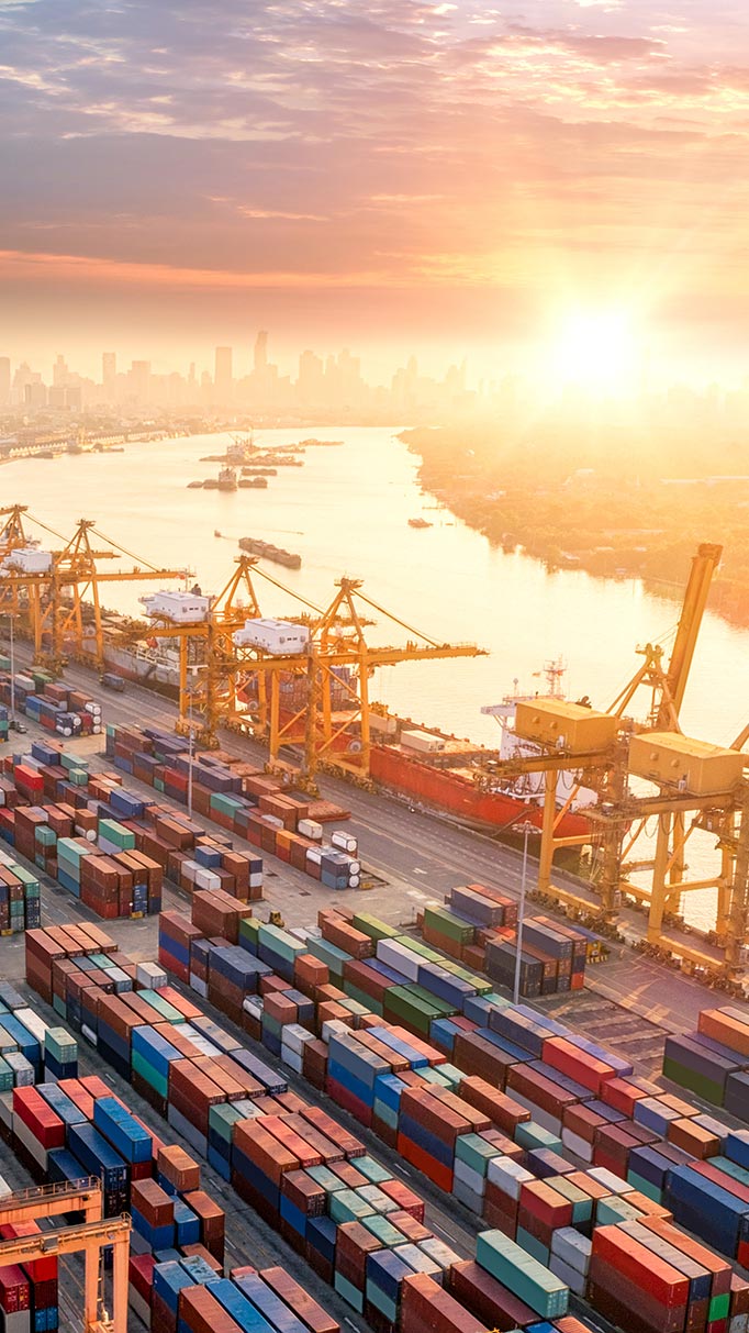 A bustling container port with numerous cargo containers, facilitating efficient transportation and trade.